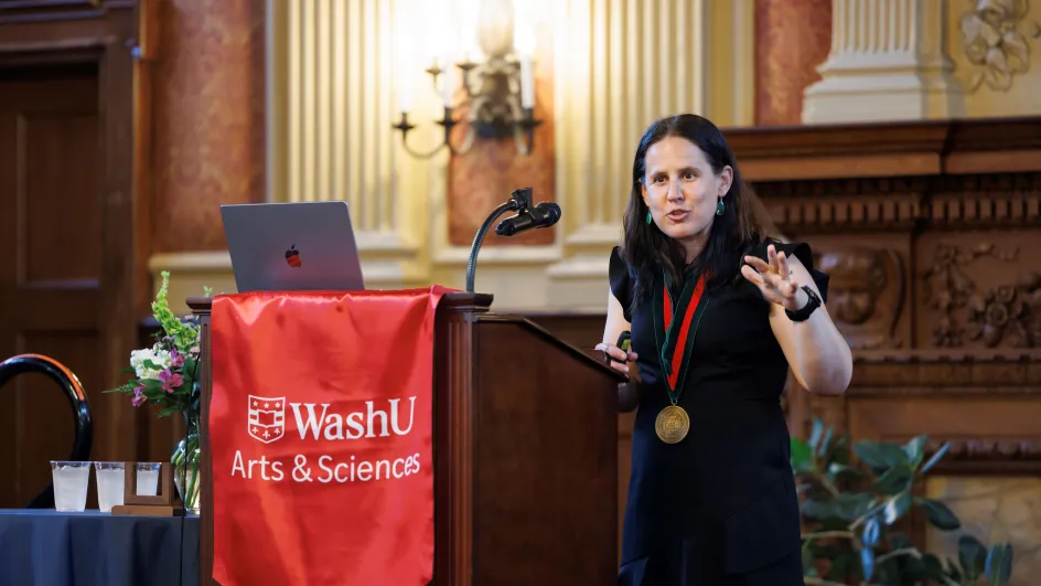 Photo of Betsy Sinclair giving a speech in front of an audience