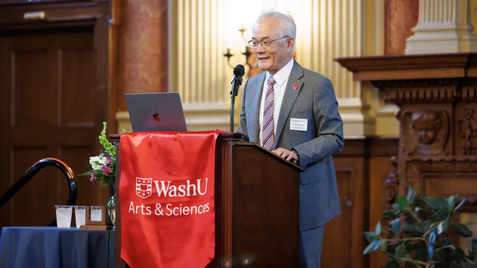 Photo of Dean Feng Sheng Hu giving a speech to an audience